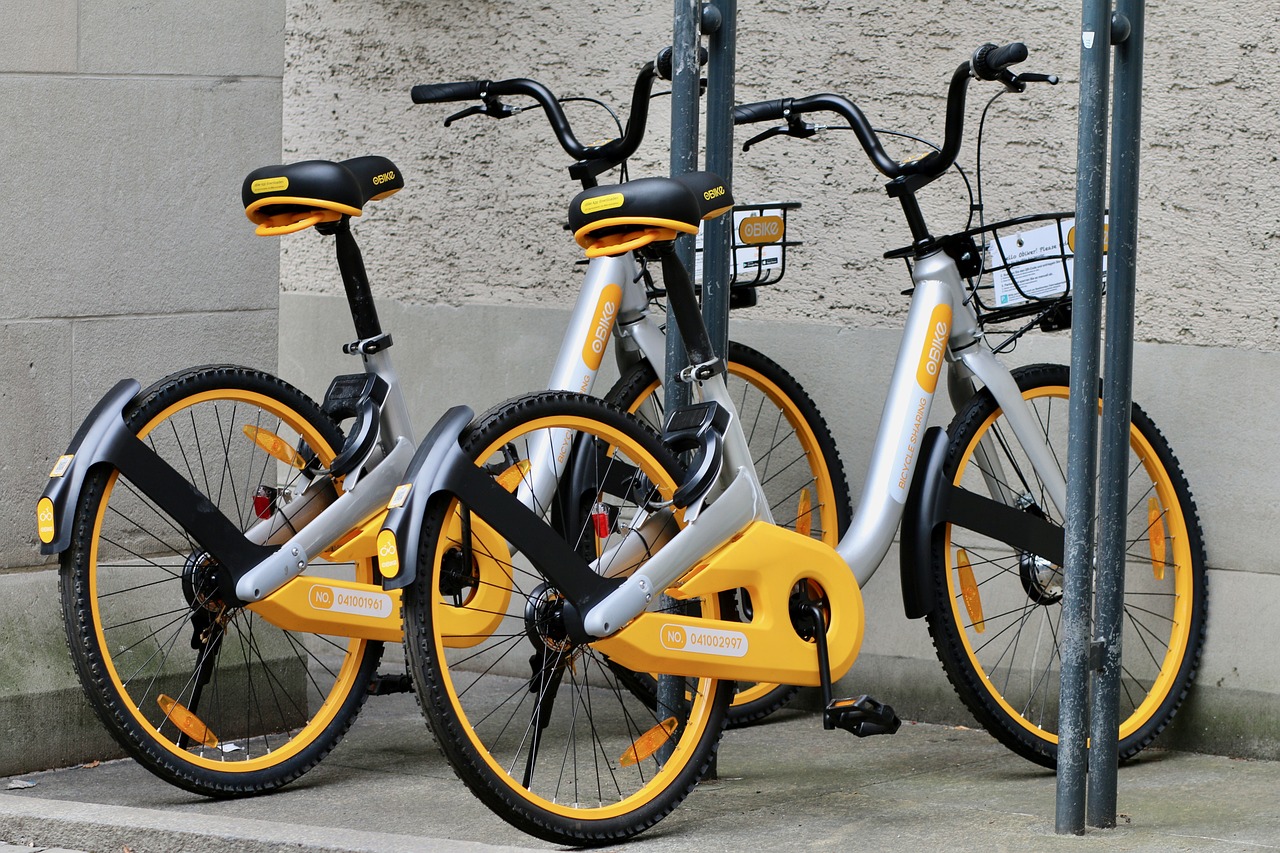 Yellow o.bike bicycles parked on a street, showcasing the original o.bike sharing service